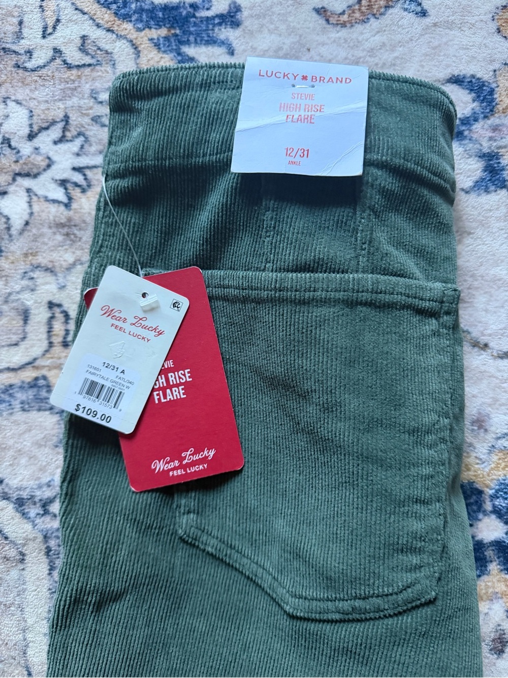 Lucky Brand Stevie High Rise Flare Corduroy Pants in Olive Green